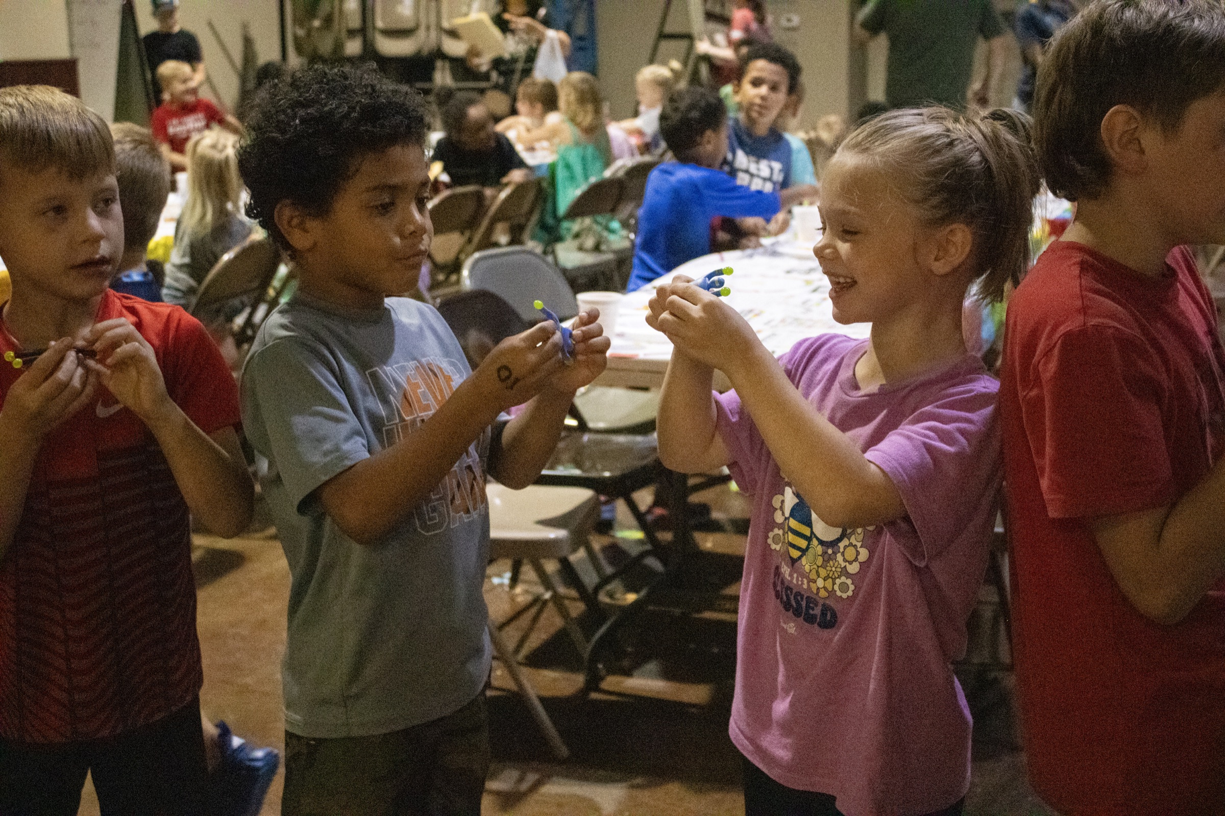 Children enjoying a hands-on activity at Gospel Light